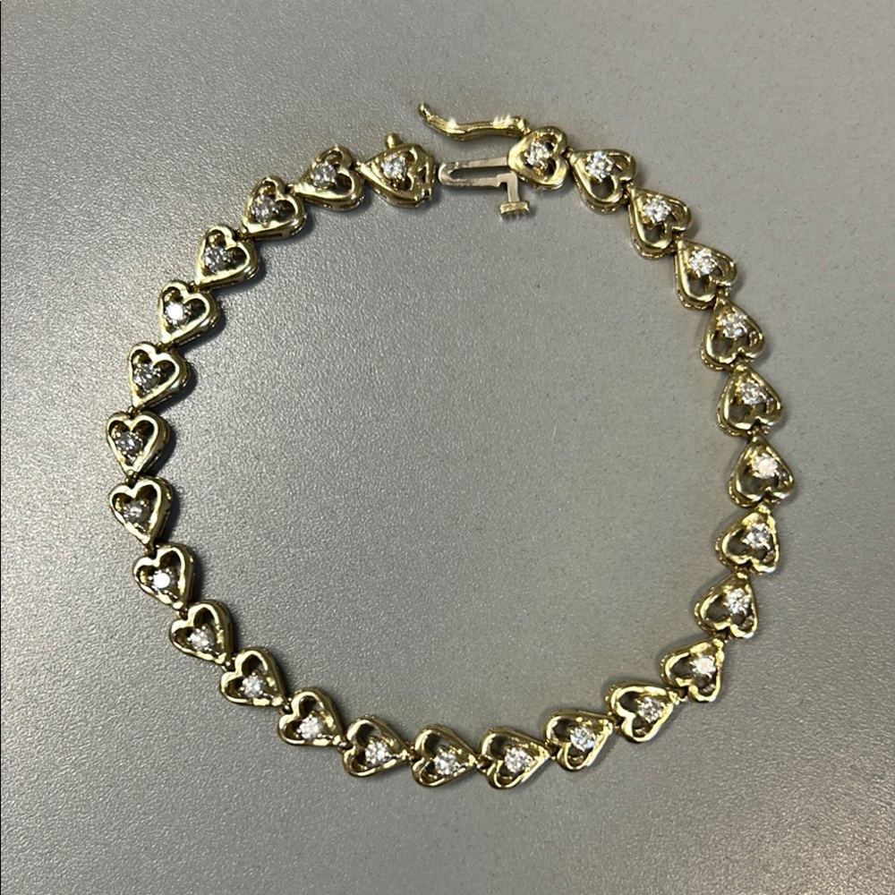 14 k Diamond and yg Gold Heart Link tennis Bracelet. Price is final!